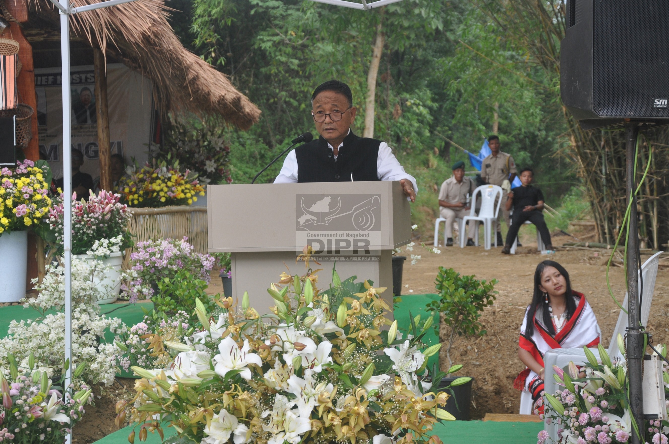 Minister, Forest, Environment & Climate Change, C.L. John addressing during the second day of the Chega Gaadi/Lamsim Ngyi-cum- Mini Hornbill Festival held at Beikingpuichak, District Headquarter, Peren on 30th October 2026. (IA Peren)
